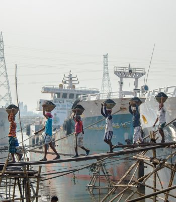 workers, people, boats, ships, pier, port, coal workers, shipping, shipping port, crossing bridge, wooden plank, workers, workers, workers, workers, workers, port